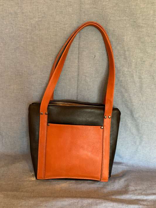 Bespoke leather handbag with unique custom interior