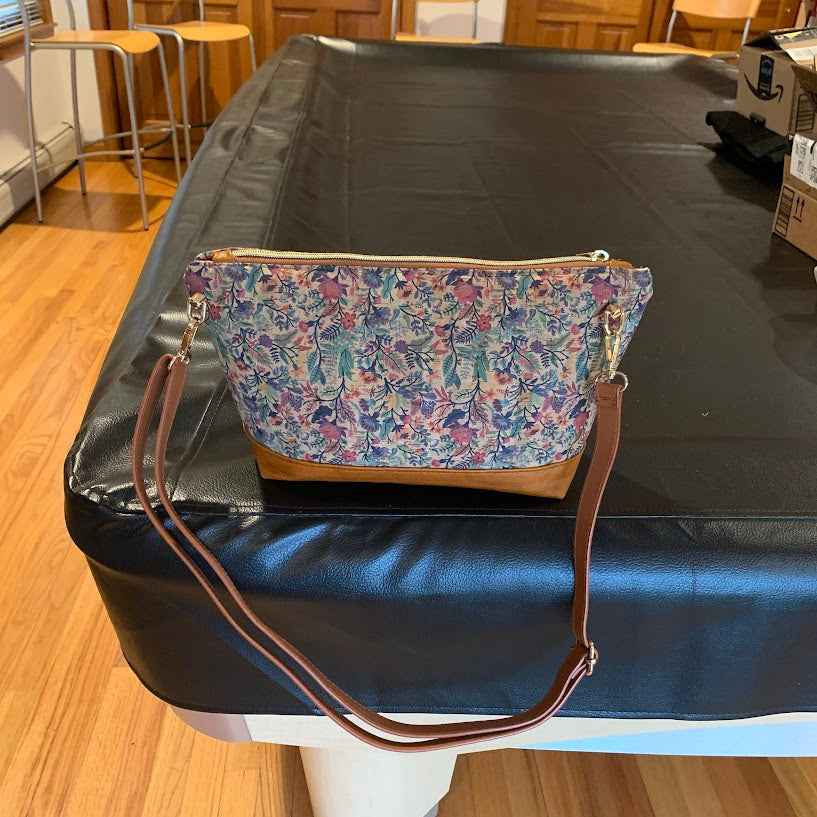 Cork crossbody with leather enhancement.