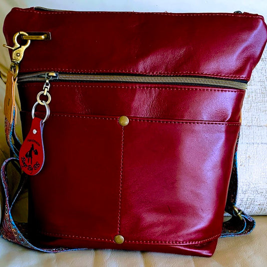 Beautiful reddish/merlot leather midsize crossbody with pockets galore