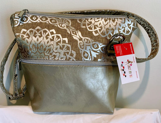 Leather and designer fabric mid-size crossbody