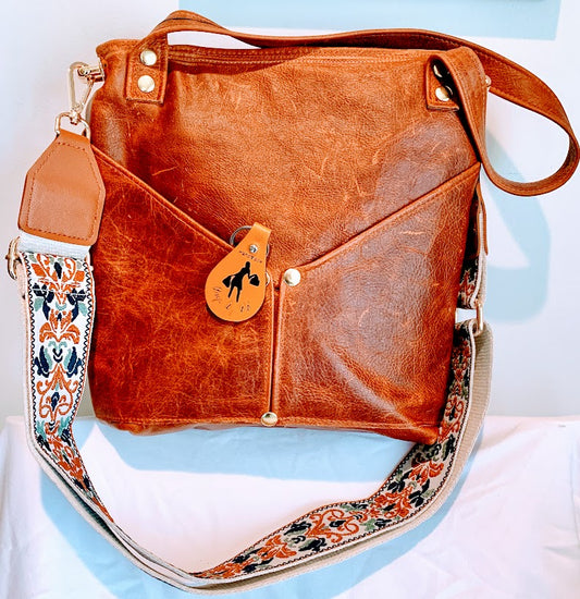 All leather, fully lined caramel colored distressed leather