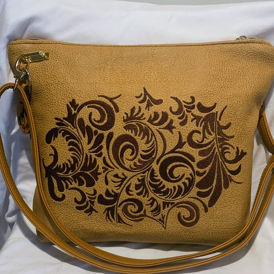 Beautiful crossbody of caramel colored Italian leather with embroidery