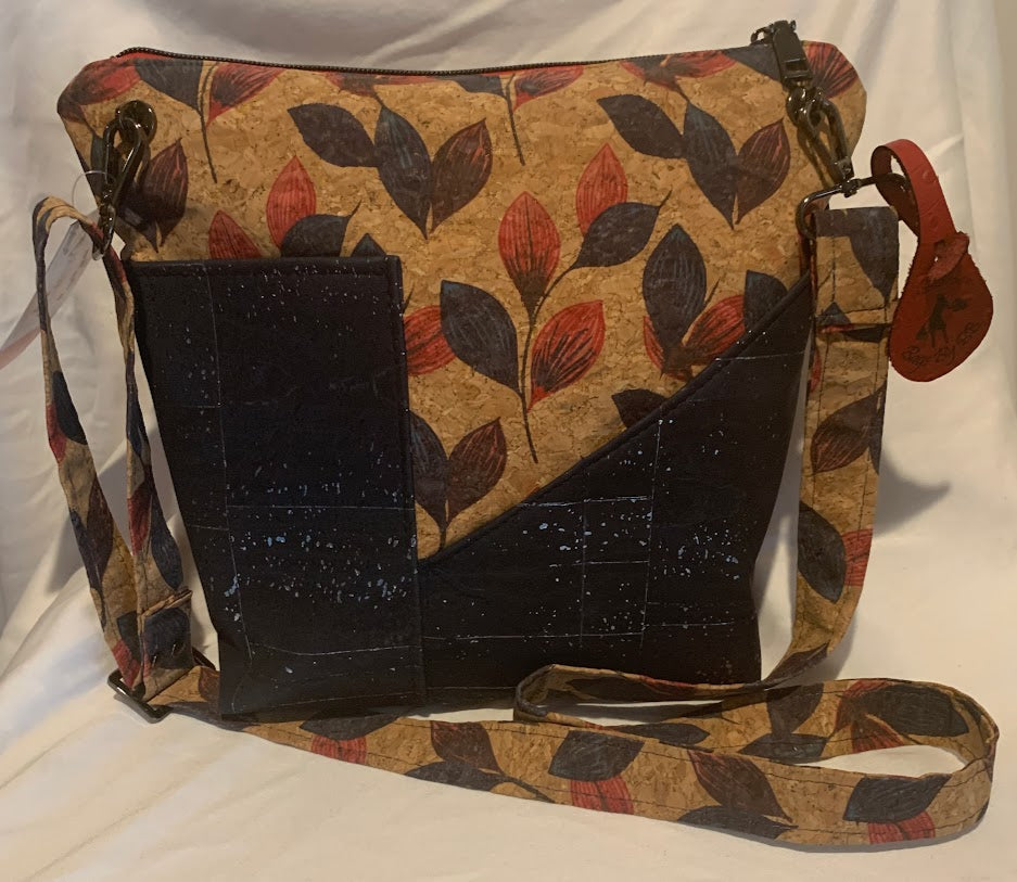 All cork, fully lined mid sized bag with matching adjustable strap