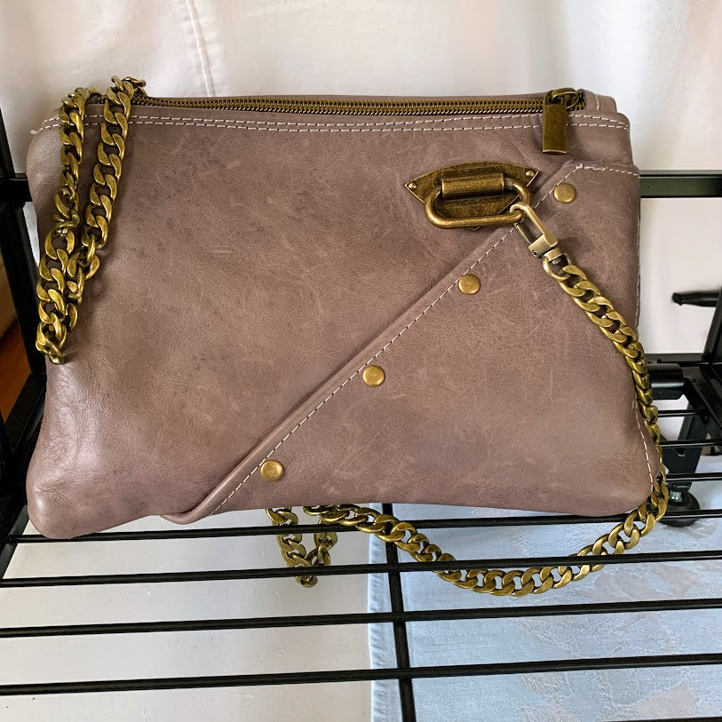 Mauve leather clutch/bag with heavy antique gold chain