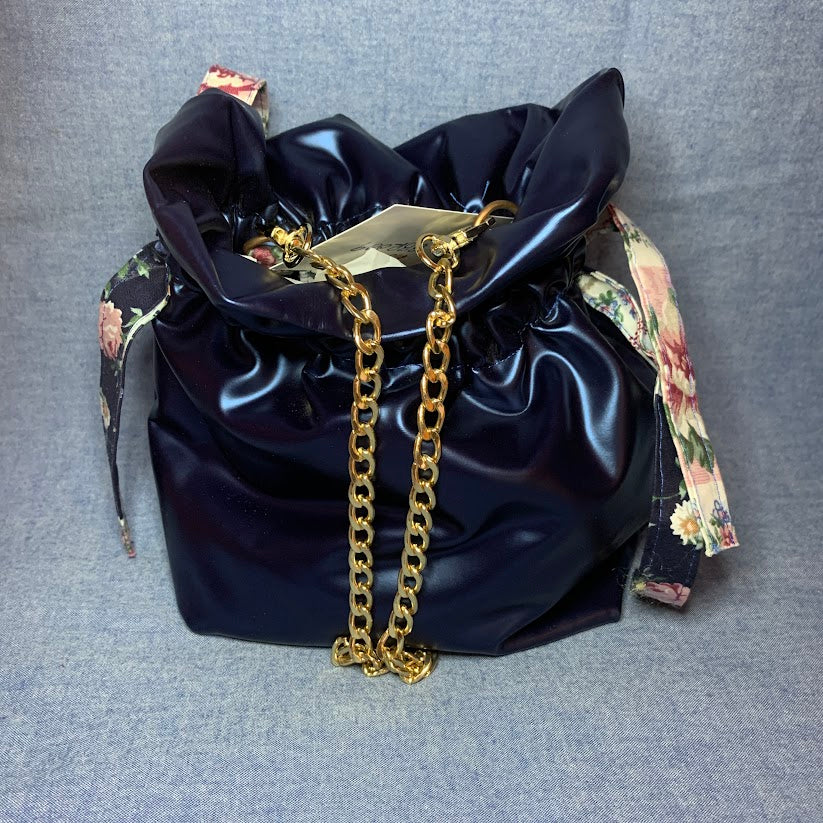 Period piece : women's' Victorian reticule (pouch), the fore-runner of the handbag in faux leather