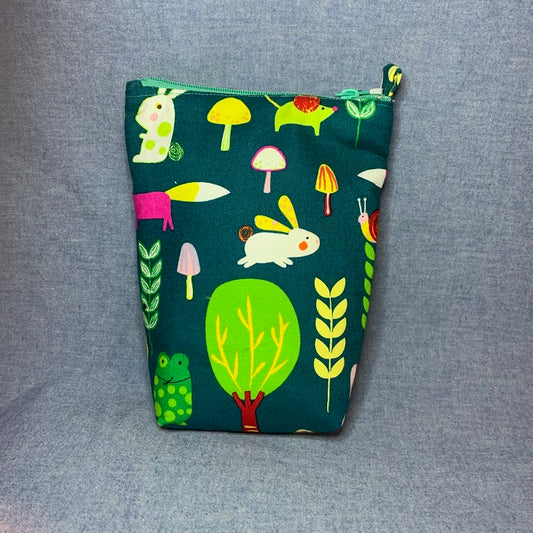 Standing fabric pouch with woodland scene
