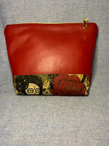 Faux leather and fabric pouch
