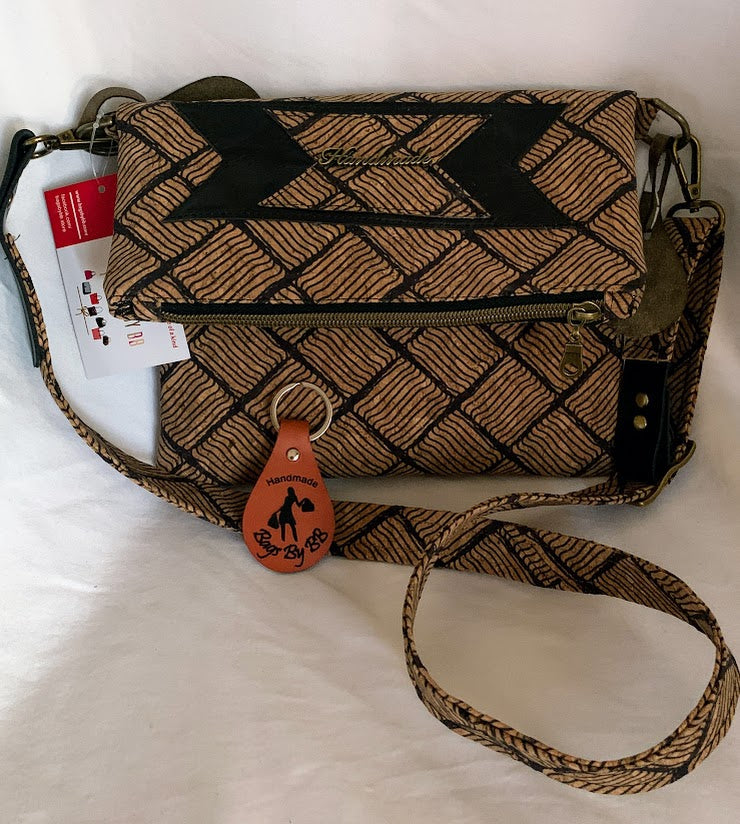 all cork fold over bag with adjustable strap