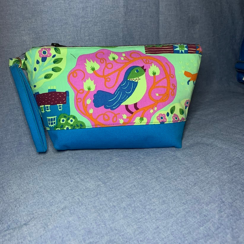 Fabric and canvas wristlet with colorful farm scene