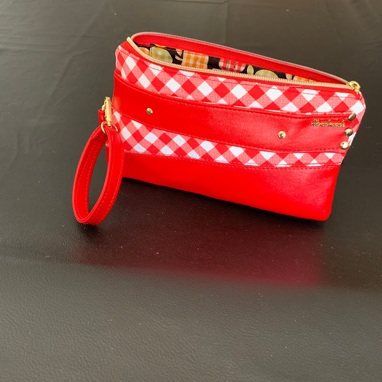 Clutch Wristlet in gingham canvas and red vinyl.